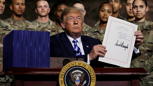 ABD Başkanı Donald Trump, 2019 Savunma Bütçesi'ni onayladı. (Fotoğraf: Reuters)