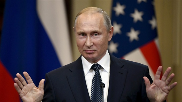 File photo: Russia's President Vladimir Putin gestures during the joint press conference