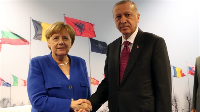 Recep Tayyip Erdoğan and Angela Merkel