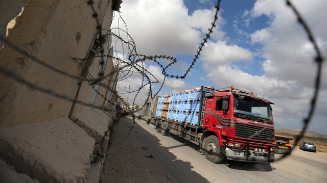 A truck carrying goods arrives at Kerem Shalom crossing in Rafah in the southern Gaza Strip August 15, 2018. 