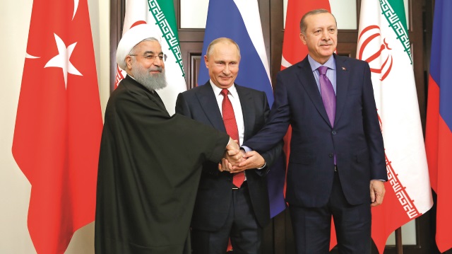 Arşiv: Cumhurbaşkanı Recep Tayyip Erdoğan, Rusya Federasyonu Devlet Başkanı Vladimir Putin ve İran Cumhurbaşkanı Hasan Ruhani 'Türkiye-Rusya-İran Üçlü Zirvesi'nde bir araya gelmişlerdi.