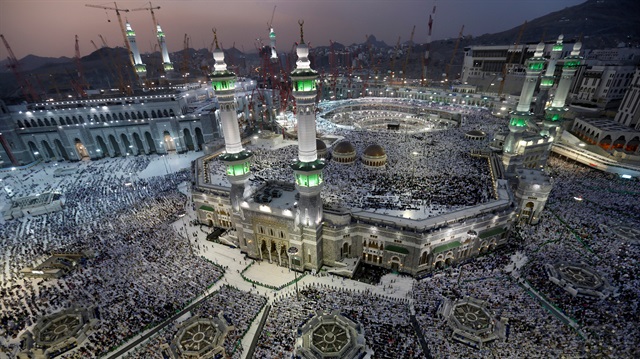 File photo: Muslim pilgrims pray around the holy Kaaba at the Grand Mosque