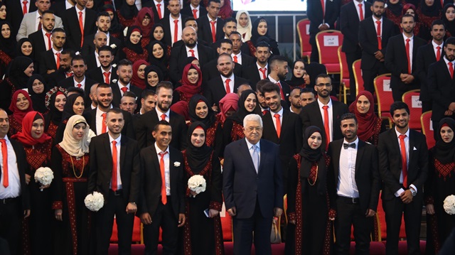 الرئاسة الفلسطينية تنظم عرسًا جماعيًّا برام الله لـ500 عريس وعروس