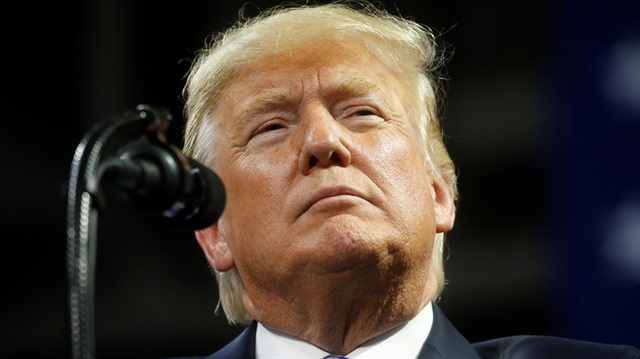 U.S. President Donald Trump pauses as he speaks at a Make America Great Again rally at the Civic Center in Charleston, West Virginia
