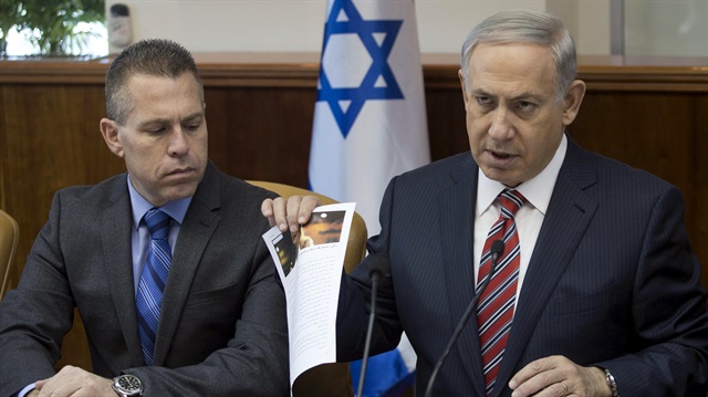 File photo: Israeli Prime Minister Benjamin Netanyahu (R) sits next to Israeli Public security Minister Gilad Erdan during the weekly cabinet meeting in Jerusalem