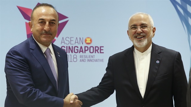 File photo: Turkish Foreign Minister Mevlut Çavuşoğlu (L) shakes hands with Iranian Foreign Minister Javad Zarif (R) 