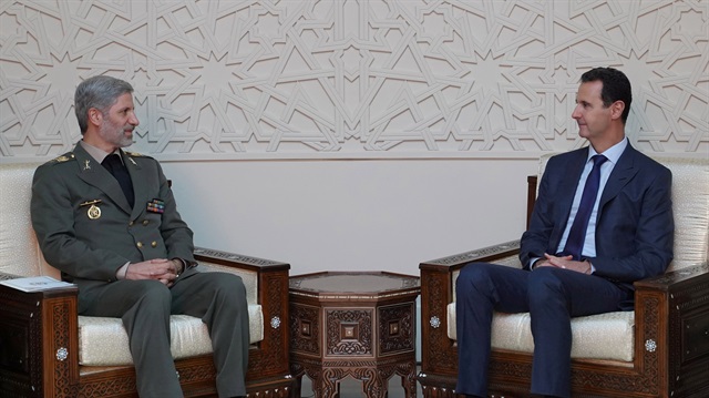 Syrian President Bashar al Assad meets with Iranian Defence Minister Amir Hatami