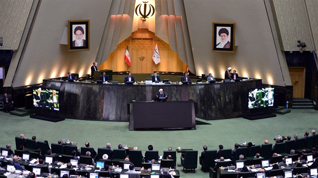 Iranian President Hassan Rouhani arrives to answer questions during a Parliament session in Tehran, Iran, on August 28, 2018. 