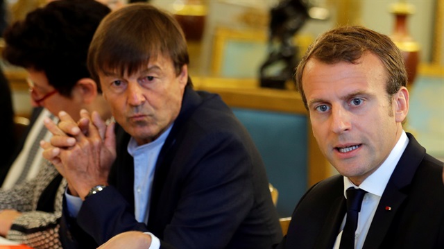 File photo: French President Emmanuel Macron (R) and Minister forr the Ecological and Inclusive Transition Nicolas Hulot (L) meet with NGO to discuss climate and environment at the Elysee Palace in Paris, France