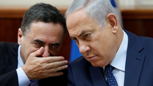Israeli Prime Minister Benjamin Netanyahu (R)  and  Israeli Intelligence Minister Yisrael Katz 