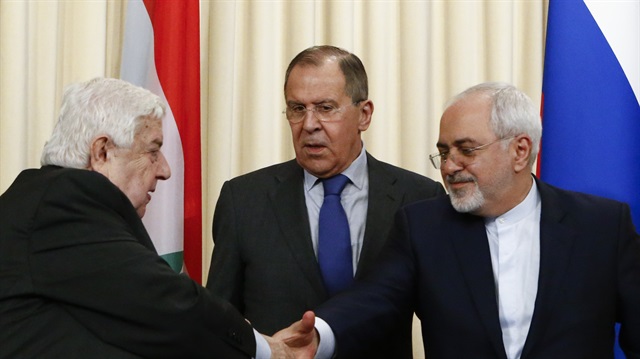 File photo: Foreign Ministers, Sergei Lavrov (C) of Russia, Walid al-Muallem (L) of Syria and Mohammad Javad Zarif of Iran, attend a news conference in Moscow
