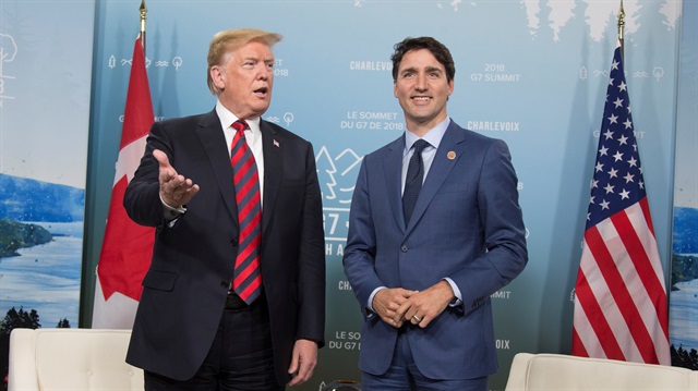 File photo: Canada's Prime Minister Justin Trudeau (R) meets with U.S. President Donald Trump