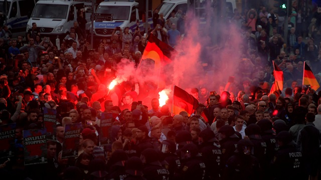 Right-wing supporters protest after a German man was stabbed last weekend in Chemnitz, Germany, August 27, 2018