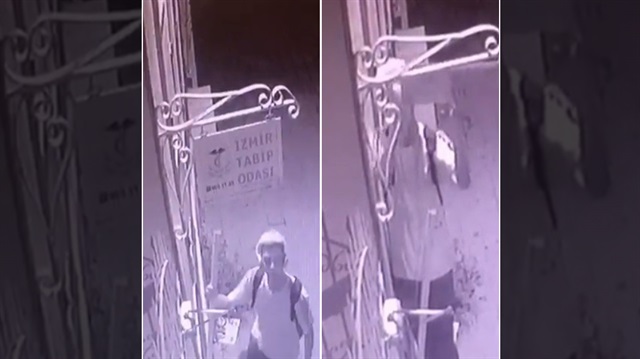 İzmir'deki hırsızın Tabip Odası'nın tabelasını çaldığı anlar güvenlik kamerasına yansıdı.