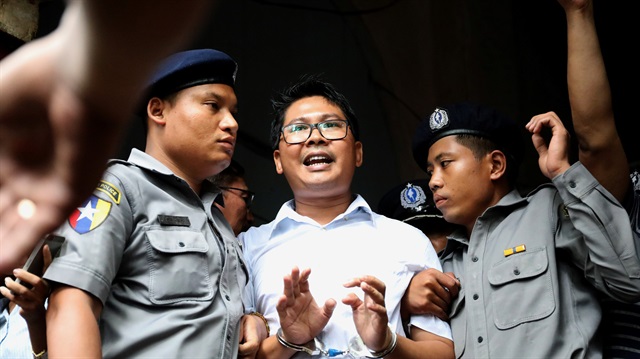 File phoot: Reuters journalist Wa Lone departs Insein court after his verdict announcement in Yangon, Myanmar, September 3, 2018.