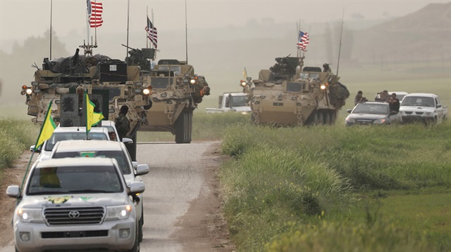 The YPG headd a convoy of U.S military vehicles in the town of Darbasiya next to the Turkish border, Syria April 28, 2017.