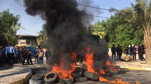 Iraqi authorities declare city-wide curfew in Basra to quell protests