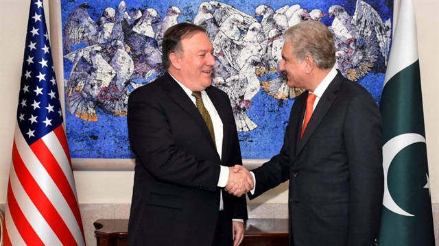 Pakistan's Foreign Minister Shah Mehmood Qureshi shakes shakes hand with U.S. Secretary of State Mike Pompeo at the Ministry of Foreign Affairs in Islamabad, Pakistan September 5, 2018