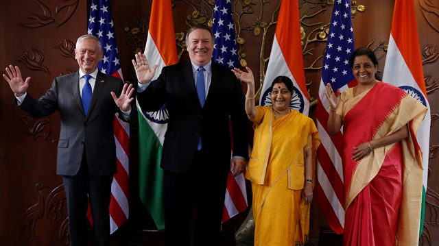 U.S. Secretary of State Mike Pompeo and Secretary of Defence James Mattis pose beside India’s Foreign Minister Sushma Swaraj and Defence Minister Nirmala Sitharaman before the start of their meeting in New Delhi, India, September 6, 2018. 