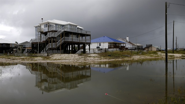 Flood waters from Tropical Storm Gordon are seen in front of a house in Dauphin Island, Alabama, U.S., September 5, 2018.