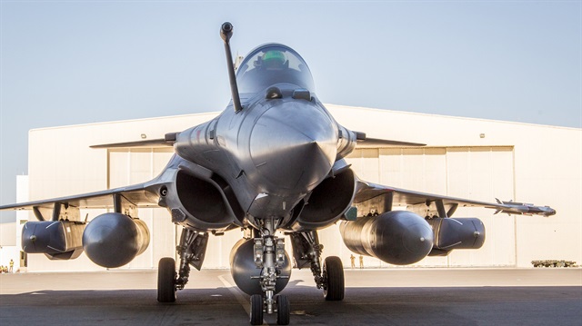 A French Rafale fighter jet, carrying cruise missiles