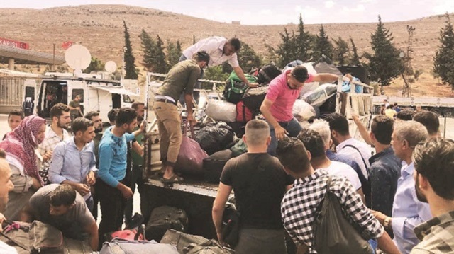 Idlib residents flee ahead of looming offensive against the northwestern Syria region