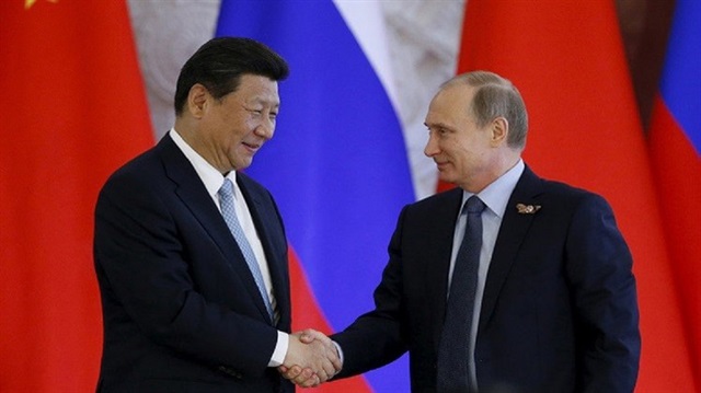 بوتين: نسعى لتعزيز استخدام العملات الوطنية في التجارة مع الصين