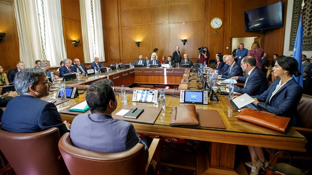Iran's Deputy Foreign Minister Hossein Jaberi Ansari, Russia's special envoy on Syria Alexander Lavrentiev, Turkish Deputy Foreign Minister Sedat Onal, and U.N. Special Envoy for Syria Staffan de Mistura attend a meeting during consultations on Syria at the European headquarters of the United Nations in Geneva, Switzerland September 11, 2018.