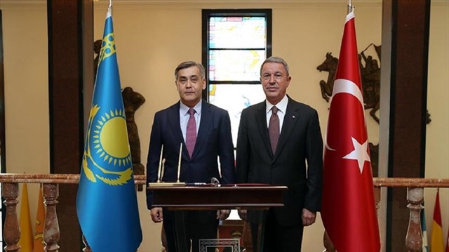 Nurlan Ermekbaev and Hulusi Akar.