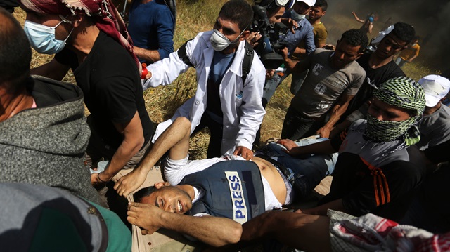 Gazeteci Yaser Murtaca, İsrail'in saldırılarını görüntülerken şehit edilmişti.
