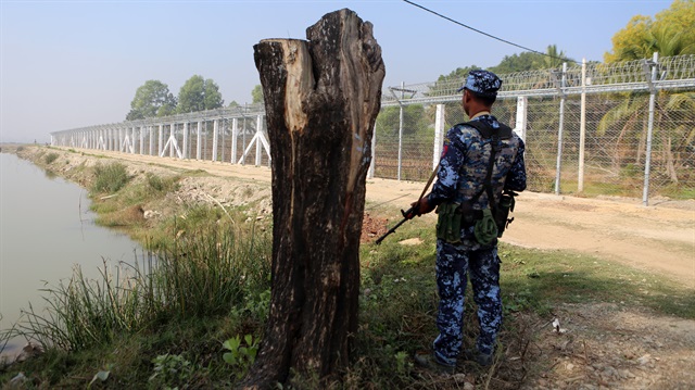 File photo: A Myanmar policeman stands outside of a camp set up by Myanmar's Social Welfare, Relief and Resettlement Minister to prepare for the repatriation of displaced Rohingyas, who fled to Bangladesh, outside Maungdaw in the state of Rakhine