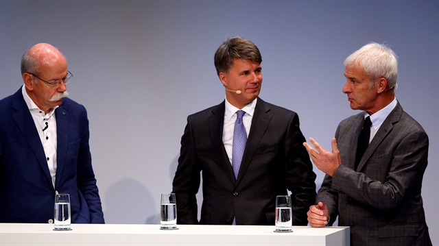 The CEO's of Volkswagen, Matthias Mueller, BMW Harald Krueger and Dieter Zetsche, of Daimler and mercedes-Benz