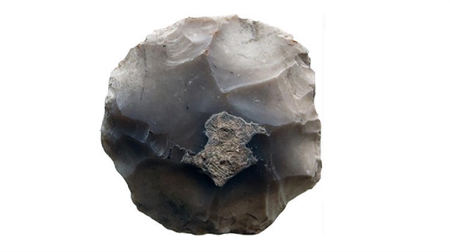 Neolitik Dönem'e ait disk biçimli bir kazıyıcı bulundu.