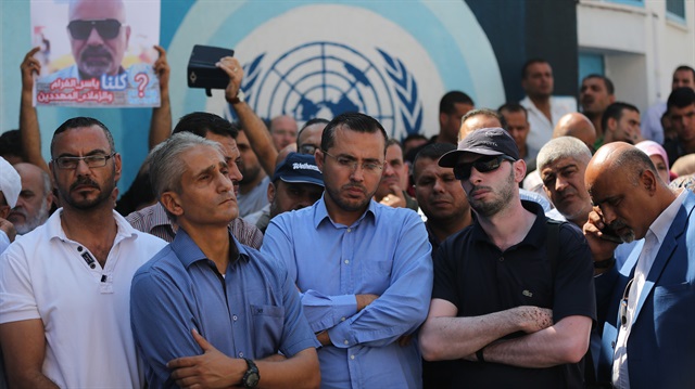 Dozens of Palestinians staged a rally to protest plans by UN refugee agency UNRWA to scale down its services