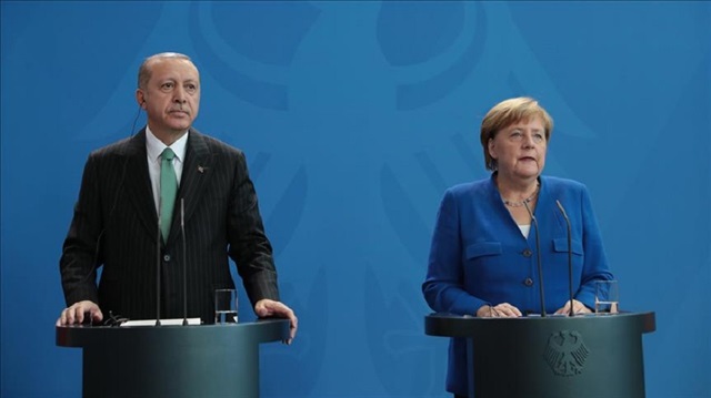 Recep Tayyip Erdoğan and Angela Merkel