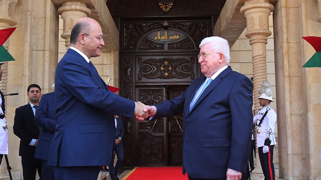 ​Irak'ın yeni Cumhurbaşkanı Berhem Salih ve görevi devraldığı eski Cumhurbaşkanı Fuad Masum