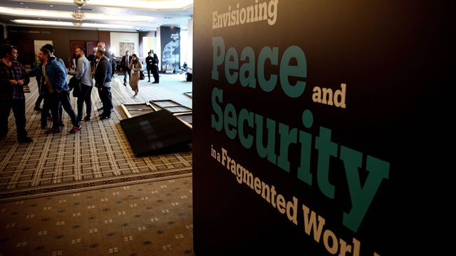 The forum is themed "Envisioning Peace and Security in a Fragmented World"