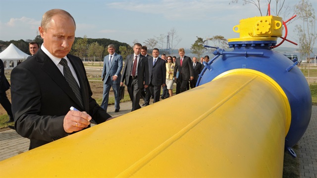 Vladimir Putin signs a natural gas pipeline in the Russian Far East city of Vladivostok on September 8, 2011. 