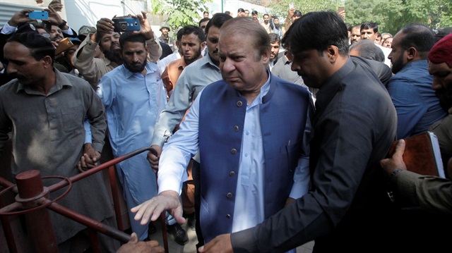 Former Prime Minister Nawaz Sharif arrives to the district High Court ahead of a hearing on treason allegations, in Lahore, Pakistan October 8, 2018