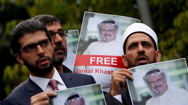 File photo: Human rights activists and friends of Saudi journalist Jamal Khashoggi hold his pictures during a protest outside the Saudi Consulate in Istanbul, Turkey 