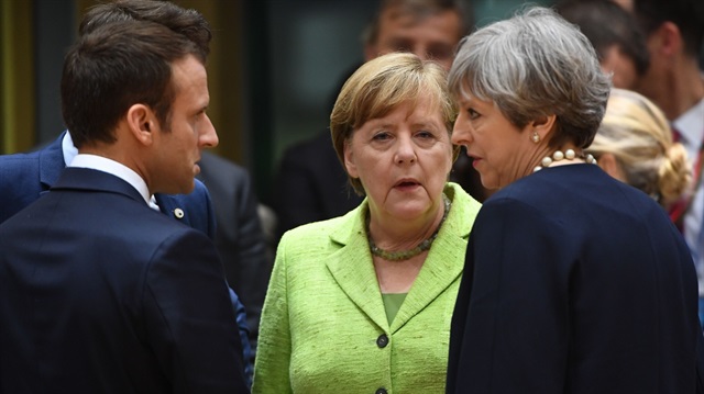 Fransa Cumhurbaşkanı Emmanuel Macron, Almanya Başbakanı Angela Merkel, İngiltere Başbakanı Theresa May