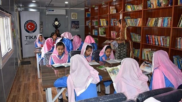 TIKA provided equipment to a hospital in Palestine and built a school library and playground in Pakistan.