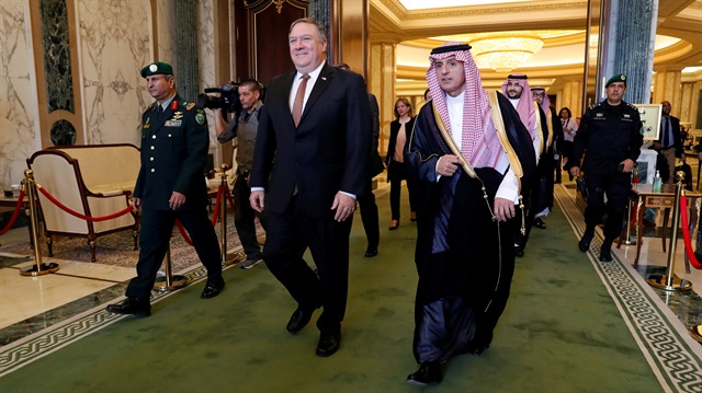 U.S. Secretary of State Mike Pompeo walks with Saudi Foreign Minister Adel al-Jubeir in Riyadh, Saudi Arabia, October 16, 2018. 