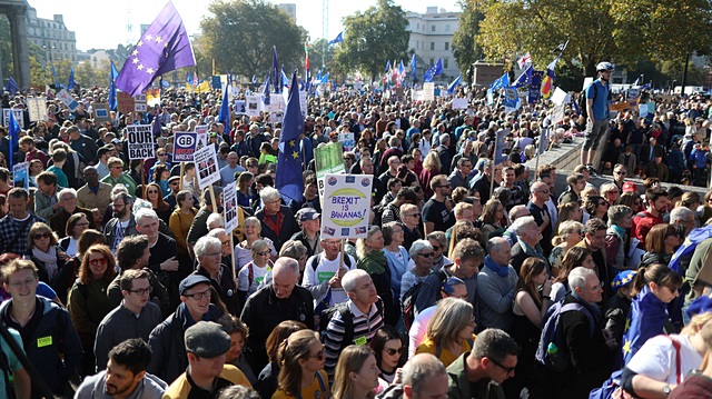 Protesters participating in an anti-Brexit demonstration, march through central London