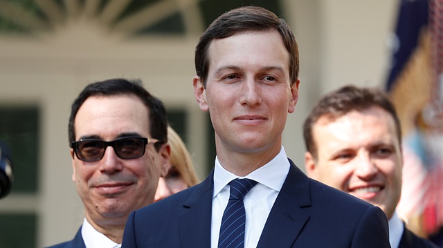 White House senior advisor Jared Kushner (C)