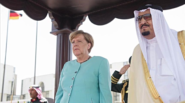 Germany's Angela Merkel and Saudi King Salman.
