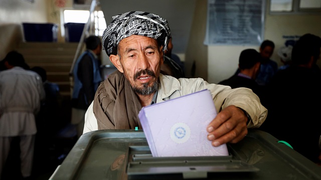 File photo: An Afghan man casts his vote during the parliamentary election at a polling station in Kabul, Afghanistan October 21, 2018.