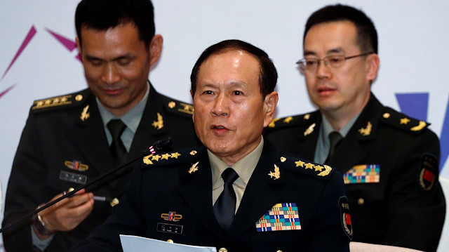 China's Minister of National Defence Wei Fenghe (C)