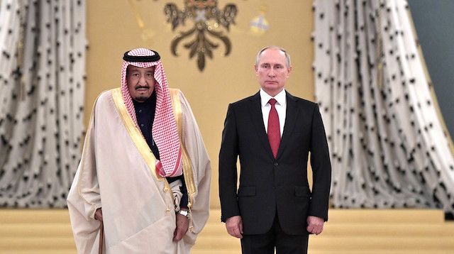 King of Saudi Arabia Salman bin Abdulaziz Al Saud and Russia's Putin