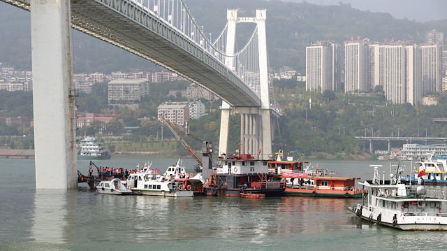Two dead after China bus plunges 60 metres into river